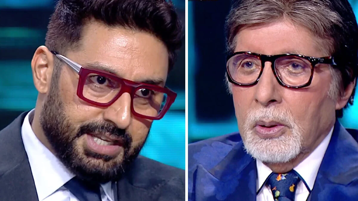 Abhishek Bachchan and Amitabh Bachchan sharing a light moment on KBC 16